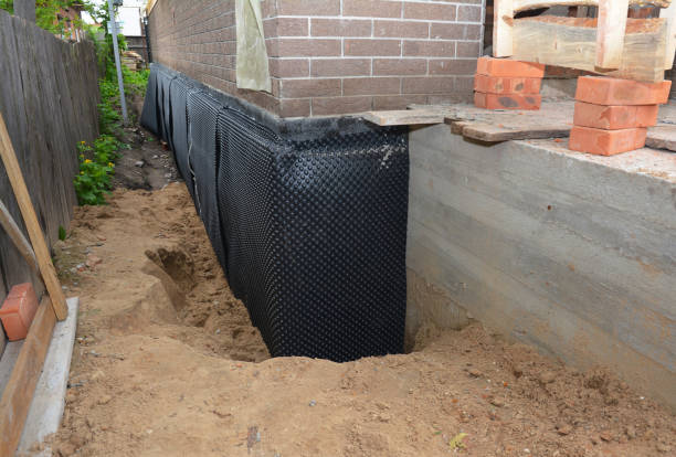 Happy homeowners after waterproofing job in Whitehouse
